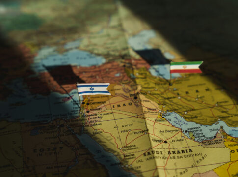 Map of the Middle East with small flags marking Israel and Iran